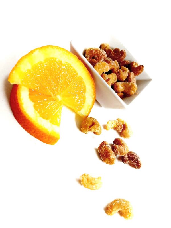 Kešu v pomerančové šťávě s vanilkou, obalené v cukru 100 g  